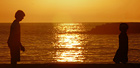 sunset with children on beach